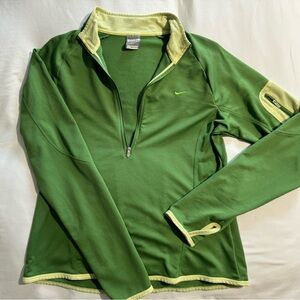 Vintage Nike zip up running pullover! Side arm pocket and thumb holes!